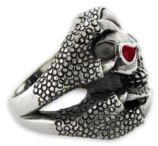 Sterling Silver Claw Holding Skull Ring with Red CZ Eyes